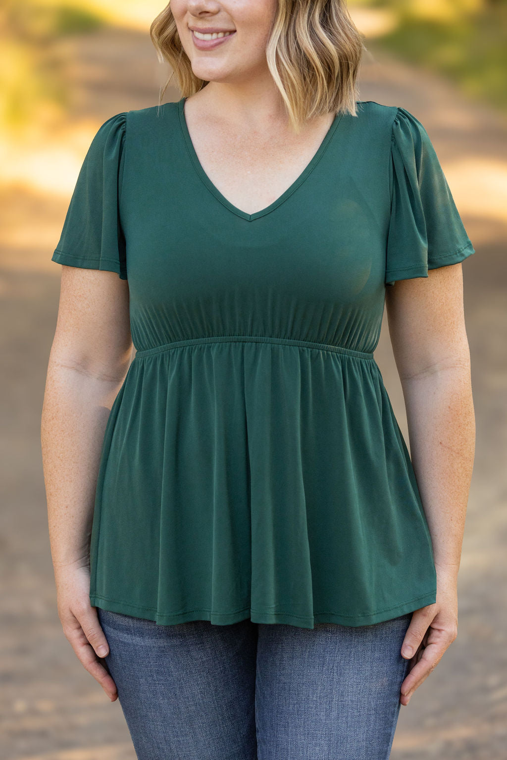 emery ruffle top hunter green womens short sleeve top