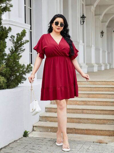 PREORDER- Plus Size Ruched Surplice Flounce Sleeve Mini Dress