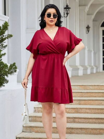 PREORDER- Plus Size Ruched Surplice Flounce Sleeve Mini Dress